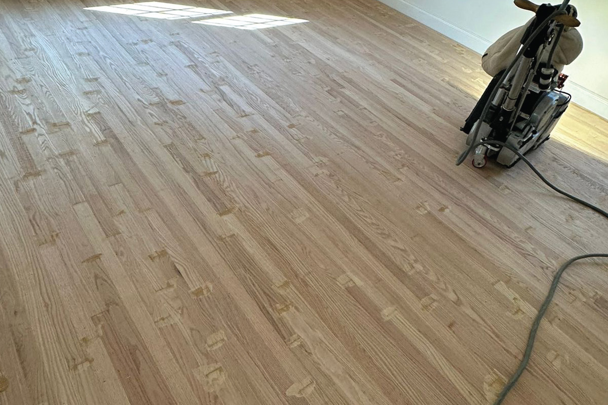 Hardwood floor refinishing — before and after